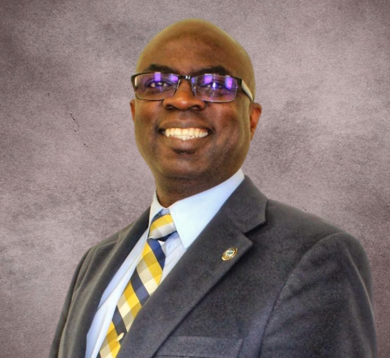 Dr. Pat Tamakloe
